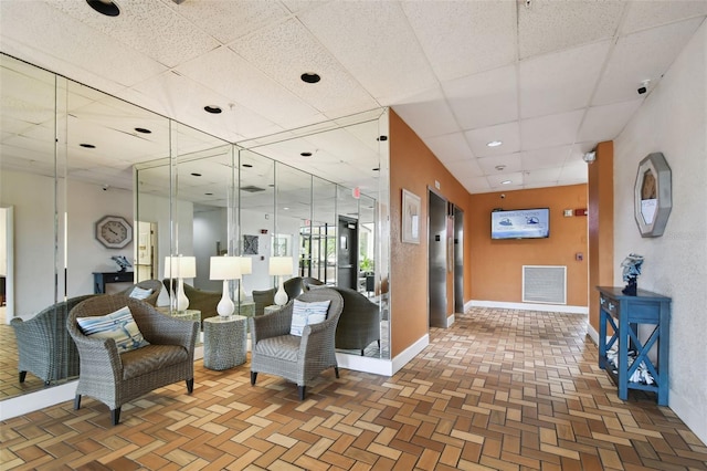 255 Dolphin Pt Unit 207, Clearwater Beach, FL 33767 - lobby with a drop ceiling