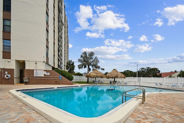 255 Dolphin Pt Unit 207, Clearwater Beach, FL 33767 - community pool with a patio area