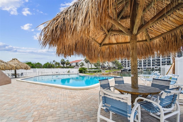 255 Dolphin Pt Unit 207, Clearwater Beach, FL 33767 - community pool with a patio and a gazebo