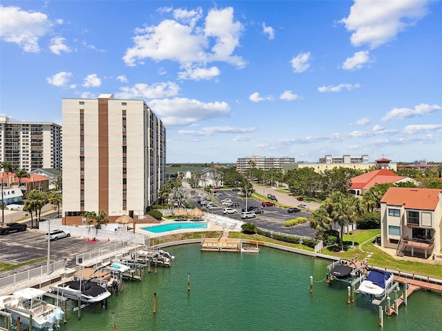 255 Dolphin Pt Unit 207, Clearwater Beach, FL 33767 - water view featuring boat lift and a dock