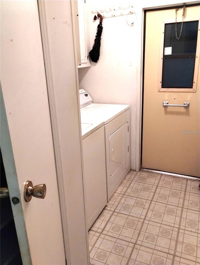 6443 Midland St, Zephyrhills, FL 33542 - laundry area with separate washer and dryer and cabinet space