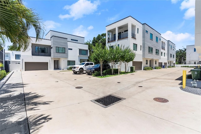4515 W N A St Unit 6, Tampa, FL 33609 - view of property with a residential view and a garage