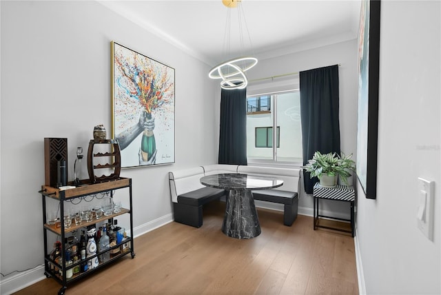 4515 W N A St Unit 6, Tampa, FL 33609 - dining space with wood finished floors and a chandelier