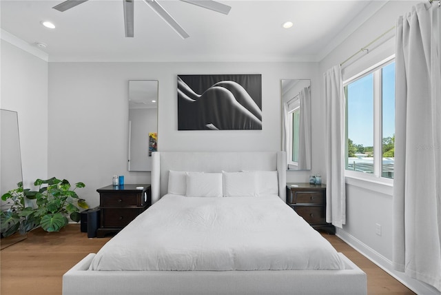 4515 W N A St Unit 6, Tampa, FL 33609 - bedroom with wood finished floors, multiple windows, recessed lighting, crown molding, and ceiling fan