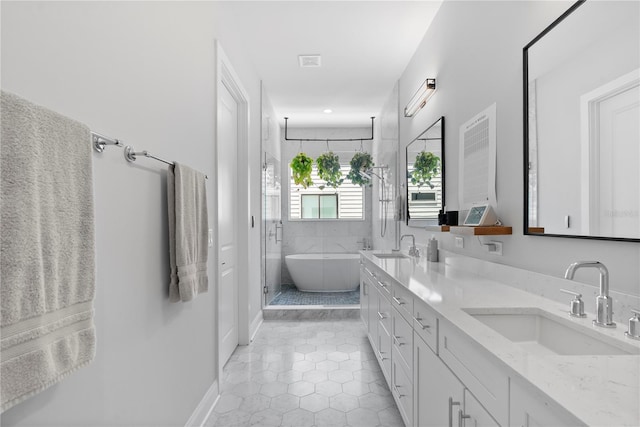 4515 W N A St Unit 6, Tampa, FL 33609 - full bath featuring a freestanding bath, double vanity, tile patterned flooring, and a shower stall