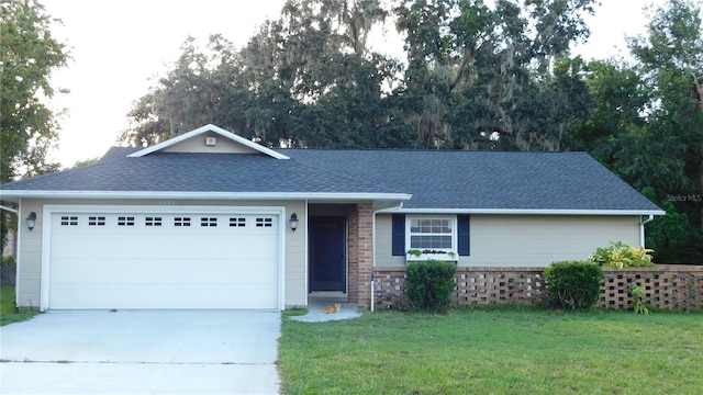 6605 Foxmoor Dr, Zephyrhills, FL 33542 - single story home featuring a front yard, concrete driveway, and a garage