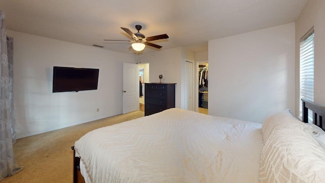 6605 Foxmoor Dr, Zephyrhills, FL 33542 - bedroom featuring carpet flooring, ceiling fan, and a closet