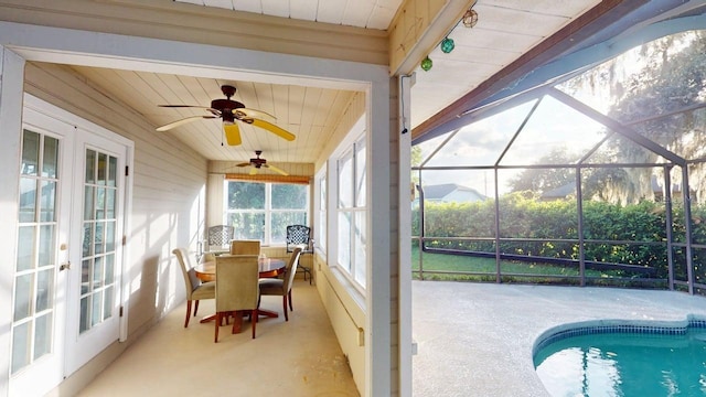 6605 Foxmoor Dr, Zephyrhills, FL 33542 - sunroom with french doors and ceiling fan