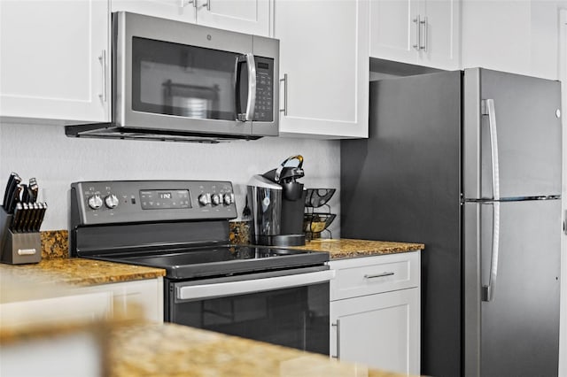 12000 Gulf Blvd Unit 506N, Treasure Island, FL 33706 - kitchen with stainless steel appliances and white cabinets