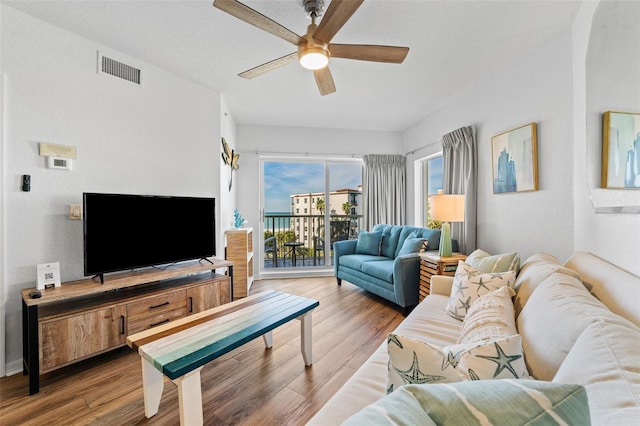 12000 Gulf Blvd Unit 506N, Treasure Island, FL 33706 - living room featuring a ceiling fan and wood finished floors