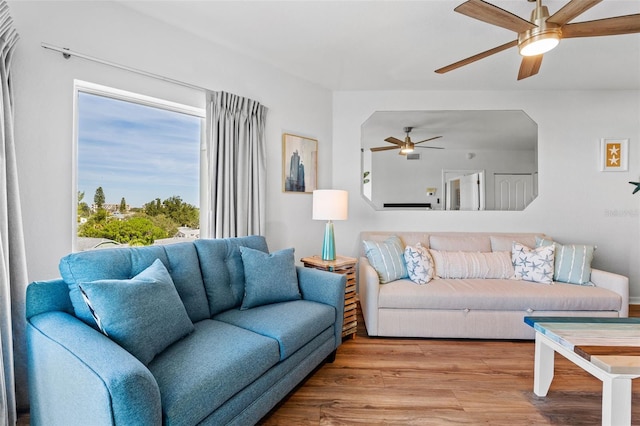 12000 Gulf Blvd Unit 506N, Treasure Island, FL 33706 - living room featuring a ceiling fan and wood finished floors