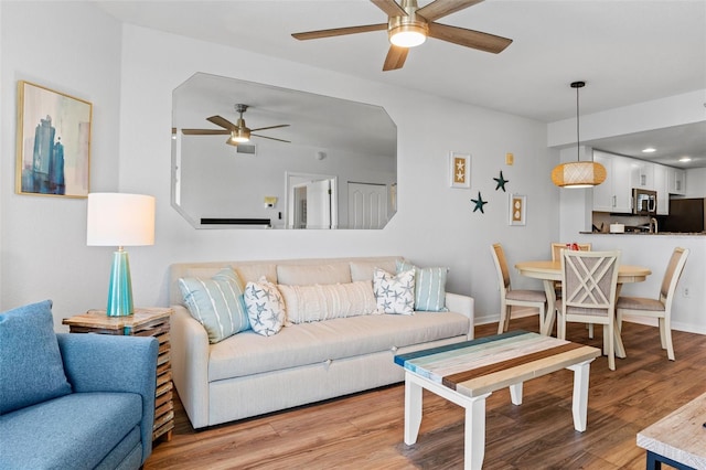 12000 Gulf Blvd Unit 506N, Treasure Island, FL 33706 - living area with a ceiling fan, light wood-style floors, and recessed lighting