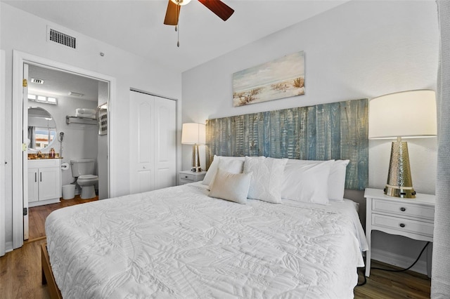12000 Gulf Blvd Unit 506N, Treasure Island, FL 33706 - bedroom featuring wood finished floors, a closet, connected bathroom, and ceiling fan