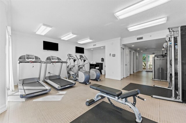 12000 Gulf Blvd Unit 506N, Treasure Island, FL 33706 - gym featuring ornamental molding and baseboards