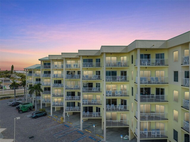 12000 Gulf Blvd Unit 506N, Treasure Island, FL 33706 - property at dusk with a view of apartment building / complex