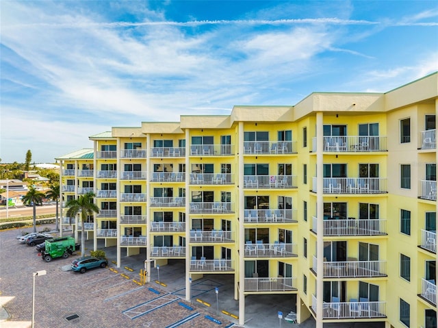 12000 Gulf Blvd Unit 506N, Treasure Island, FL 33706 - view of apartment building / complex with uncovered parking