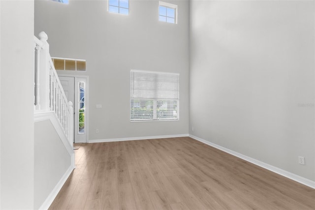 5015 58th Ter E, Bradenton, FL 34203 - foyer entrance featuring light wood-style flooring and a high ceiling