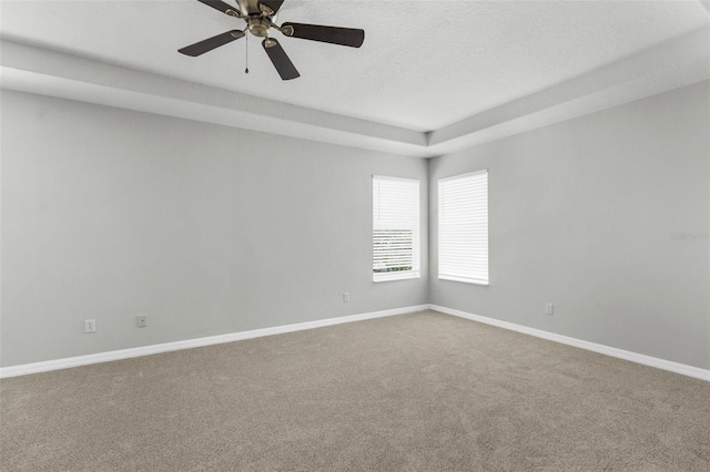 5015 58th Ter E, Bradenton, FL 34203 - empty room featuring carpet floors, a ceiling fan, and a textured ceiling