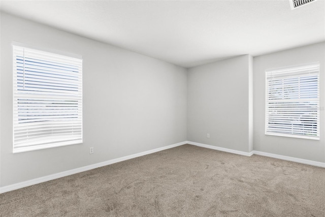5015 58th Ter E, Bradenton, FL 34203 - carpeted empty room featuring baseboards