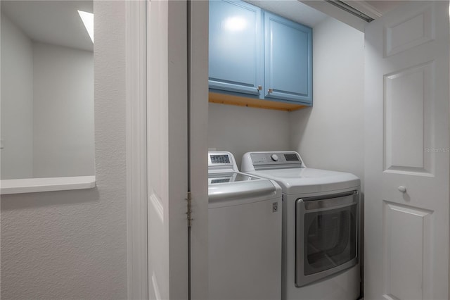 403 S Fremont Ave Unit 3, Tampa, FL 33606 - laundry room with cabinet space and washing machine and clothes dryer