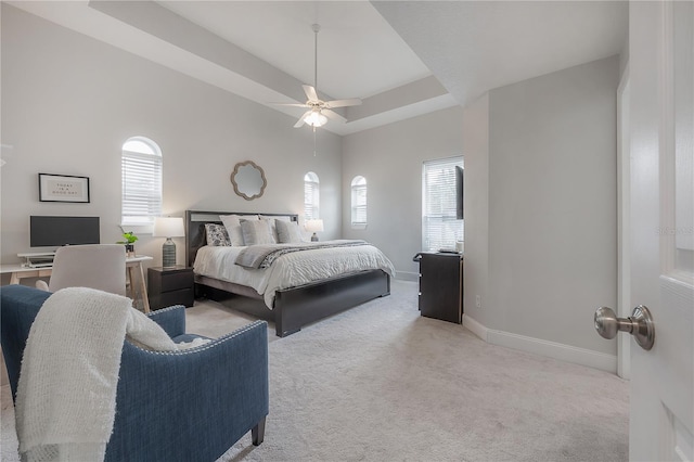 403 S Fremont Ave Unit 3, Tampa, FL 33606 - carpeted bedroom featuring a tray ceiling and a ceiling fan