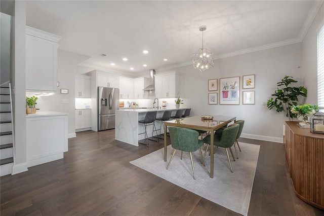 403 S Fremont Ave Unit 3, Tampa, FL 33606 - dining room featuring recessed lighting, dark wood-type flooring, stairs, a chandelier, and ornamental molding