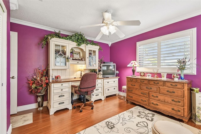 9548 141st St, Seminole, FL 33776 - office area featuring wood finished floors, a ceiling fan, and ornamental molding