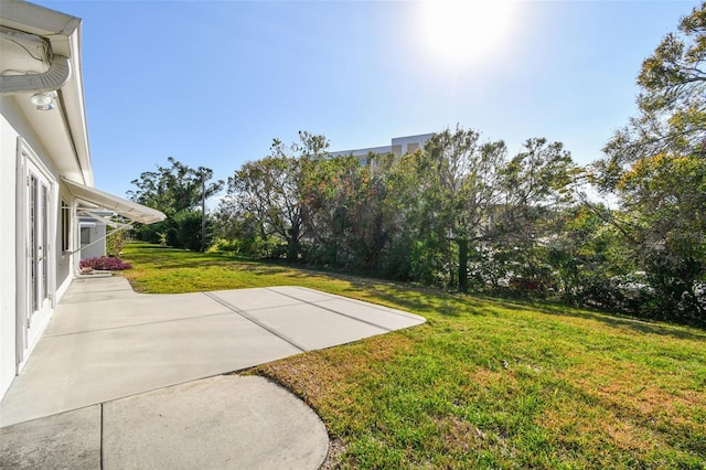 9548 141st St, Seminole, FL 33776 - view of green lawn with a patio area