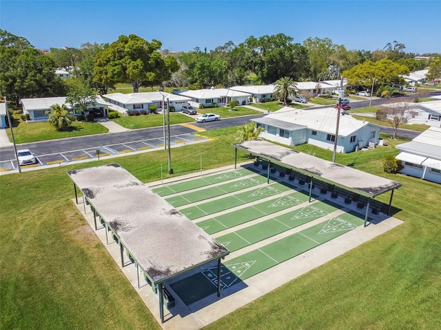 9548 141st St, Seminole, FL 33776 - view of home's community featuring shuffleboard, a lawn, and a residential view