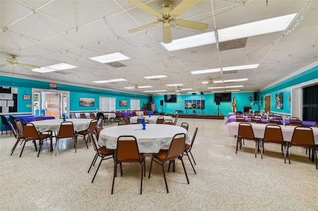 9548 141st St, Seminole, FL 33776 - dining room with a drop ceiling, speckled floor, and ceiling fan