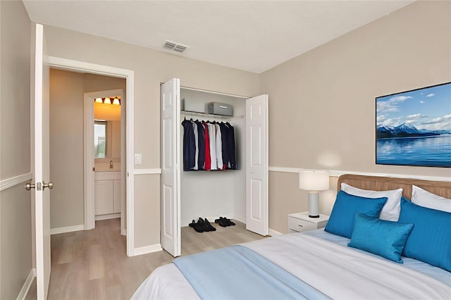 1621 Crossridge Dr, Brandon, FL 33510 - bedroom with light wood-style floors and a closet