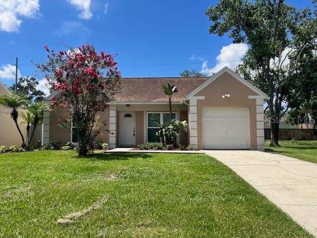 1621 Crossridge Dr, Brandon, FL 33510 - single story home featuring an attached garage, stucco siding, driveway, and a front lawn