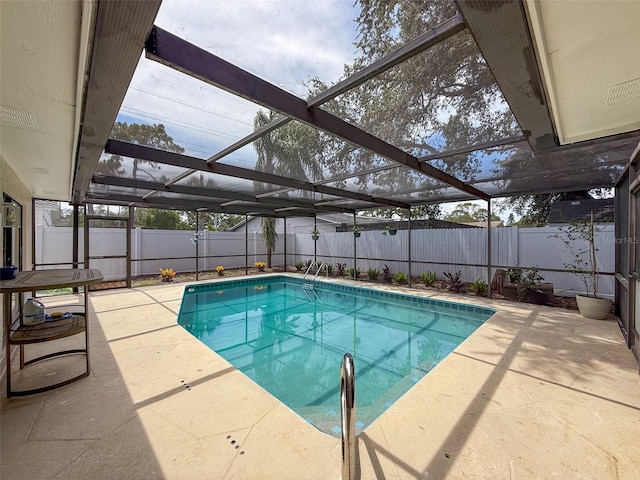 603 Ivey Ln, Tarpon Springs, FL 34689 - view of swimming pool featuring a patio area, a fenced backyard, and glass enclosure