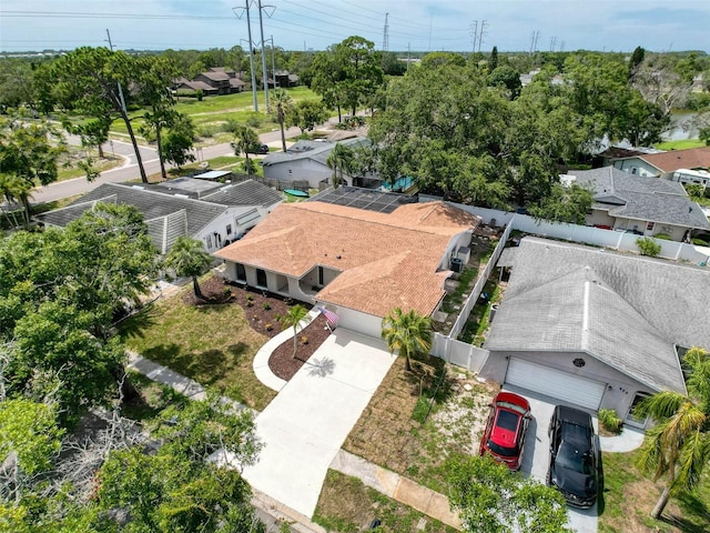 603 Ivey Ln, Tarpon Springs, FL 34689 - aerial view of residential area with a tree filled landscape