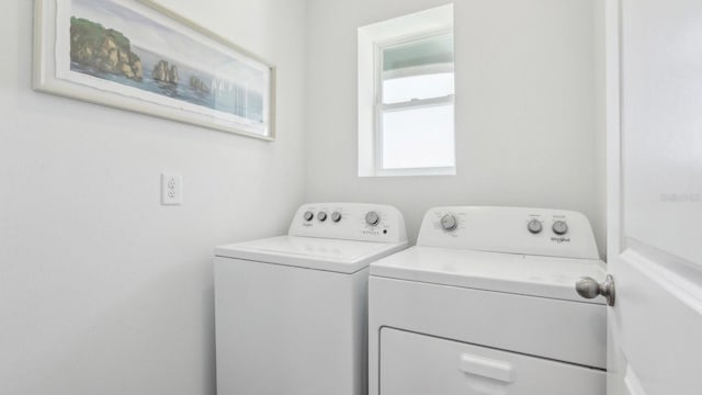 4338 Sand Dollar Way, Zephyrhills, FL 33541 - laundry room featuring washer and dryer