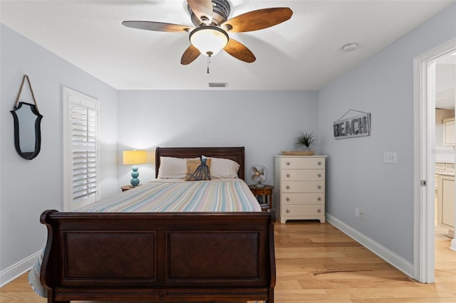 17311 Carriage Way, Odessa, FL 33556 - bedroom featuring light wood-style flooring and a ceiling fan