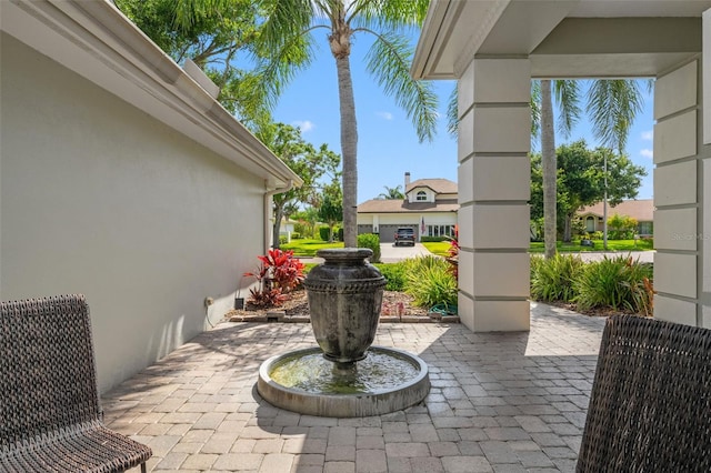 17311 Carriage Way, Odessa, FL 33556 - view of patio featuring a residential view