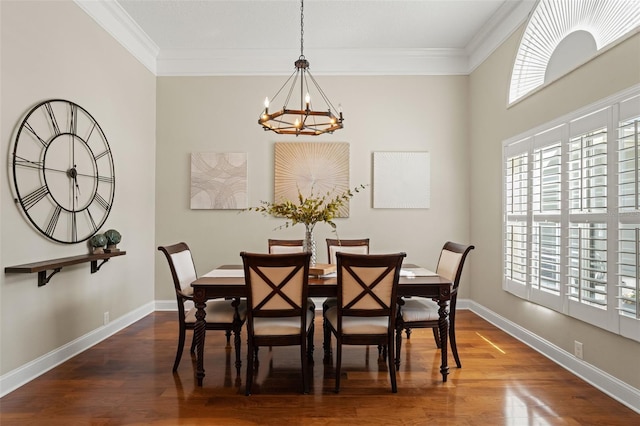17311 Carriage Way, Odessa, FL 33556 - dining space featuring a chandelier, ornamental molding, and wood finished floors