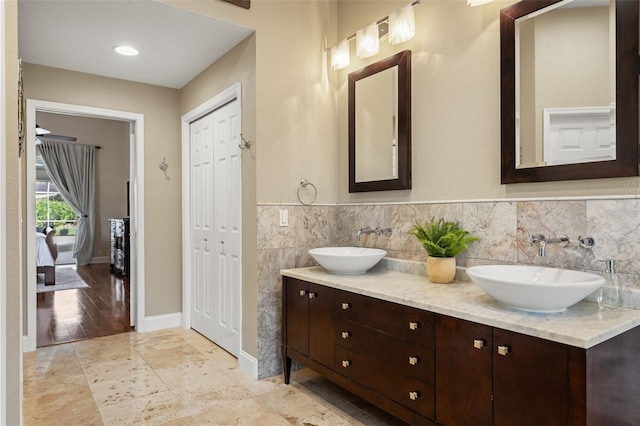 17311 Carriage Way, Odessa, FL 33556 - ensuite bathroom featuring double vanity and a closet