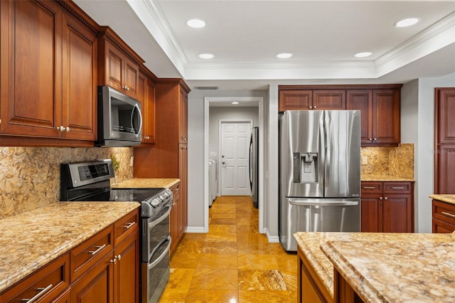 17311 Carriage Way, Odessa, FL 33556 - kitchen featuring appliances with stainless steel finishes, recessed lighting, backsplash, ornamental molding, and light stone countertops
