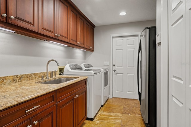 17311 Carriage Way, Odessa, FL 33556 - laundry area featuring independent washer and dryer, cabinet space, and recessed lighting