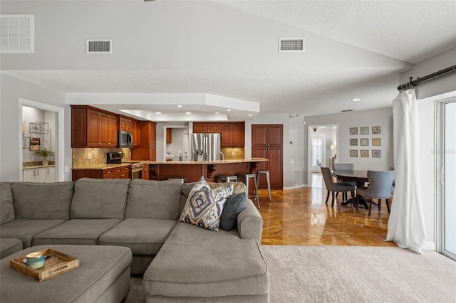 17311 Carriage Way, Odessa, FL 33556 - living room with recessed lighting and a textured ceiling