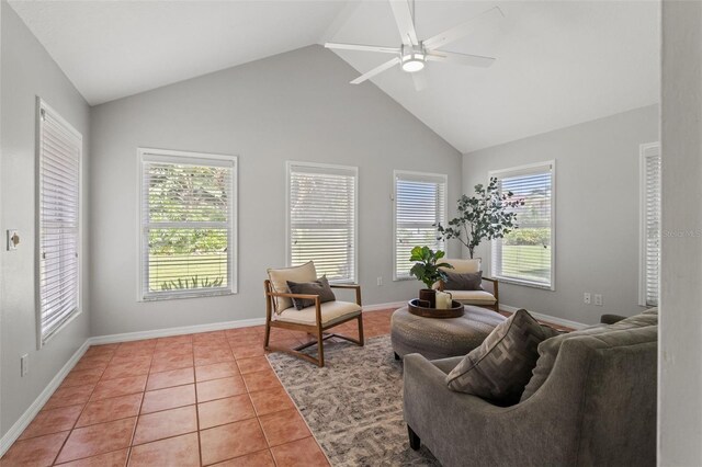 17311 Carriage Way, Odessa, FL 33556 - living area with a ceiling fan, light tile patterned flooring, and high vaulted ceiling