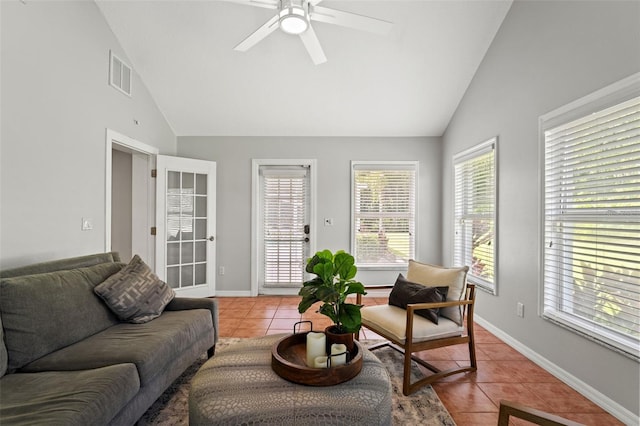 17311 Carriage Way, Odessa, FL 33556 - living room featuring light tile patterned flooring, ceiling fan, and high vaulted ceiling