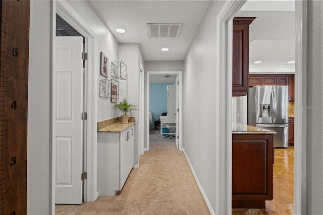 17311 Carriage Way, Odessa, FL 33556 - corridor featuring light carpet and recessed lighting