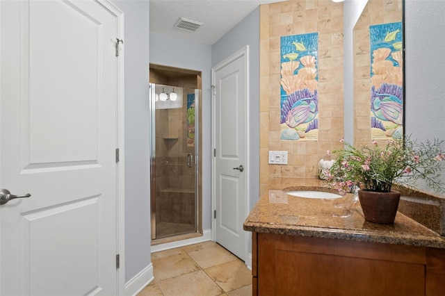 17311 Carriage Way, Odessa, FL 33556 - full bathroom featuring a shower stall, vanity, and tile patterned flooring