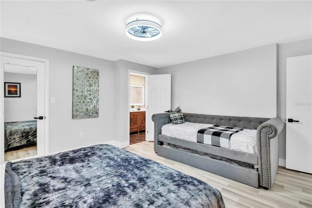 1384 S Hillcrest Ave, Clearwater, FL 33756 - bedroom with wood finished floors and ensuite bath