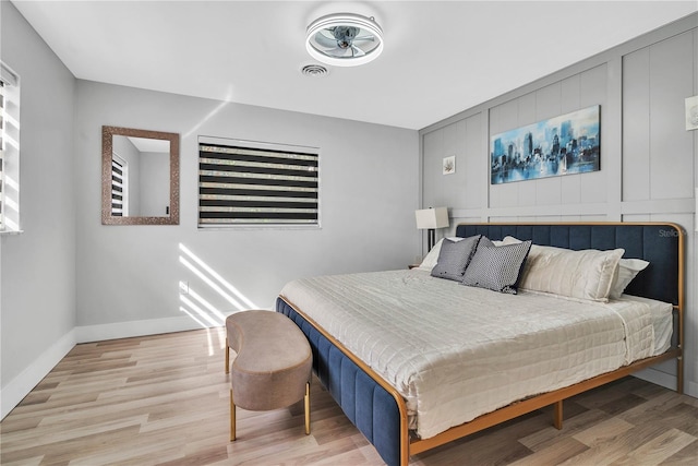 1384 S Hillcrest Ave, Clearwater, FL 33756 - bedroom with wood finished floors and baseboards