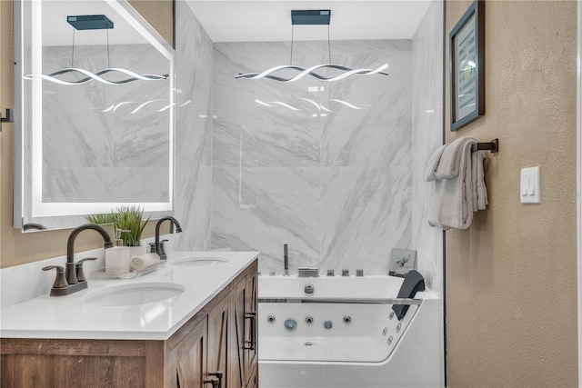 1384 S Hillcrest Ave, Clearwater, FL 33756 - full bathroom with a tub with jets, double vanity, and a textured wall
