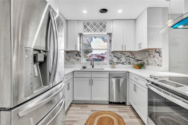 1384 S Hillcrest Ave, Clearwater, FL 33756 - kitchen featuring stainless steel appliances, light countertops, recessed lighting, white cabinetry, and tasteful backsplash